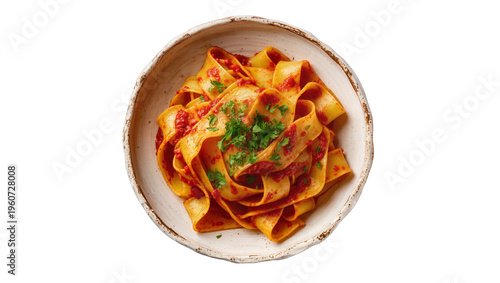 Fotografi Rustic earthenware bowl filled with vibrant tagliatelle pasta coated in rich tom