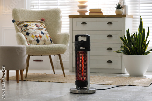 Electric heater in living room. Domestic appliance