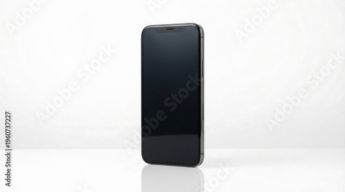 A sleek black smartphone standing upright on a white surface with a plain white background