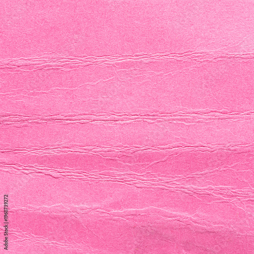 Pink crumpled wrinkled paper background or backdrop with fine details and texture with copy space for text design element