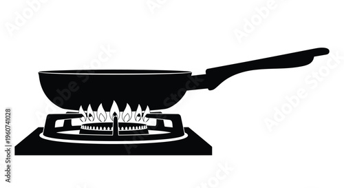 Black frying pan with flames on a stovetop a striking silhouette