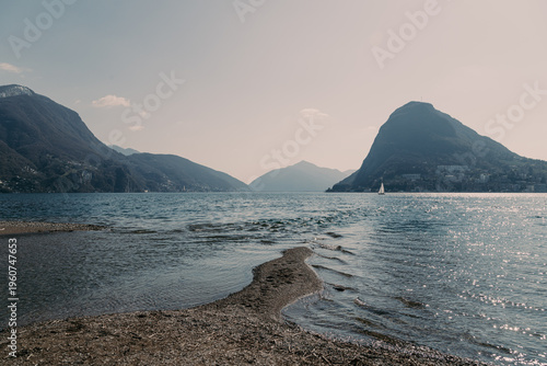 Landscape of Lake Lugano on a sunny spring day from Paradiso municipality of Lugano, canton of Ticino, Switzerland