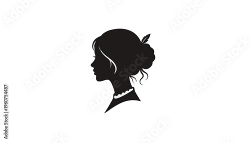 Black silhouette of a womans head with hair in a bun