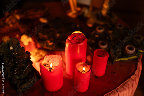 Canvastavla Red pillar candles burning, creating a dark, mystical, and occult atmosphere