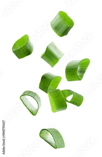 Pieces of green onion flying on transparent background
