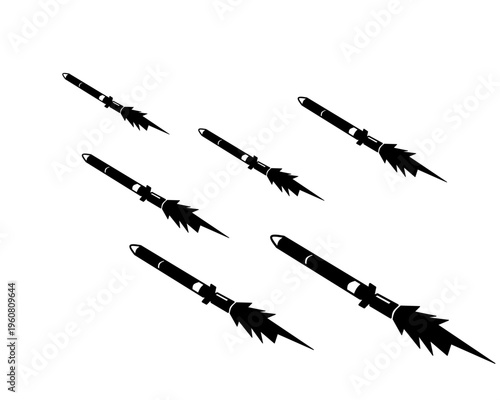 Collection of missile and rocket silhouettes in various angles and sizes. Isolated on white background. Suitable for defense technology, military equipment, aerospace, and security concept designs.