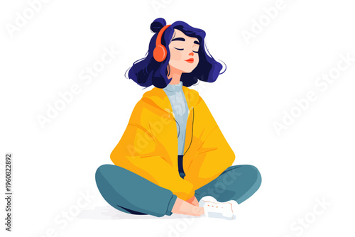 Young asian female enjoying music with headphones in casual outfit