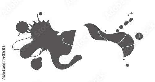 Abstract black inkblot resembling a stylized bird or fish silhouette