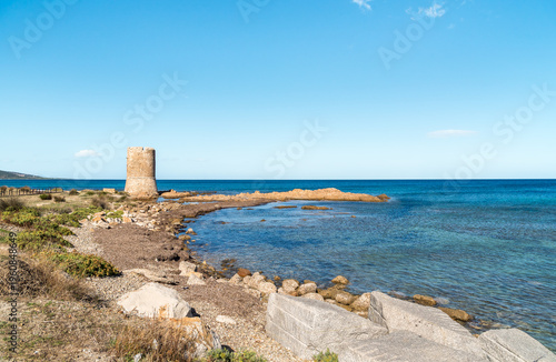 Wallpaper Mural The Tower of San Giovanni located in Posada, Sardinia, Italy. Historic coastal watchtower overlooking the Mediterranean Sea and surrounding landscape. Torontodigital.ca