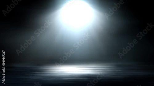 This video shows smoke moving through a spotlight, The spotlight illuminates the stage background,
Dramatic spotlight beam shining through low lying stage