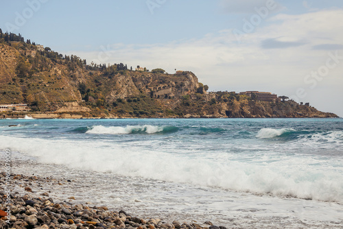 Bild auf Leinwand Ionian Sea coast in Villagonia - Taormina city on the island of Sicily, Italy