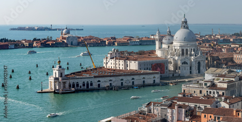 Sunlit panoramic view of Venice Grand Canal and basilica