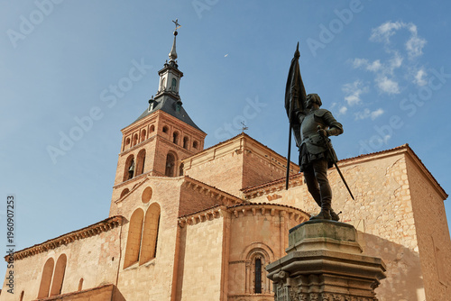 Statue of Juan Bravo and Church of San Martín in Segovia Spain