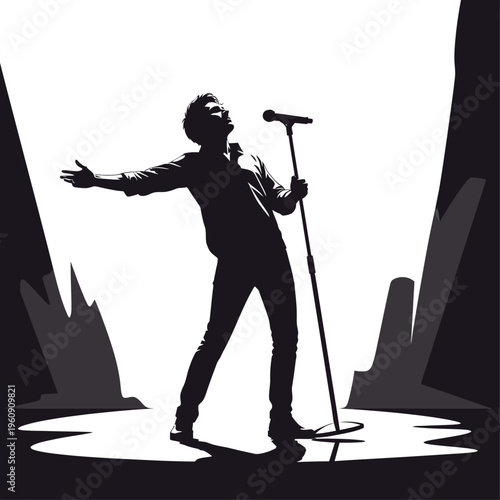 Man singing into microphone on stage.