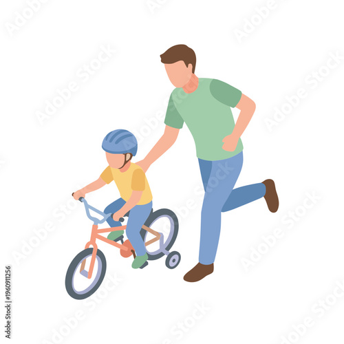 Father teaches young boy riding bicycle in park with training wheels and helmet
