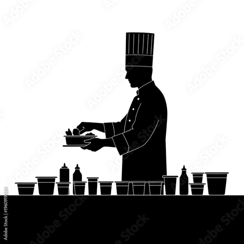 Chef in kitchen preparing food.