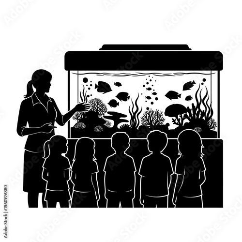 Children looking at fish tank aquarium.
