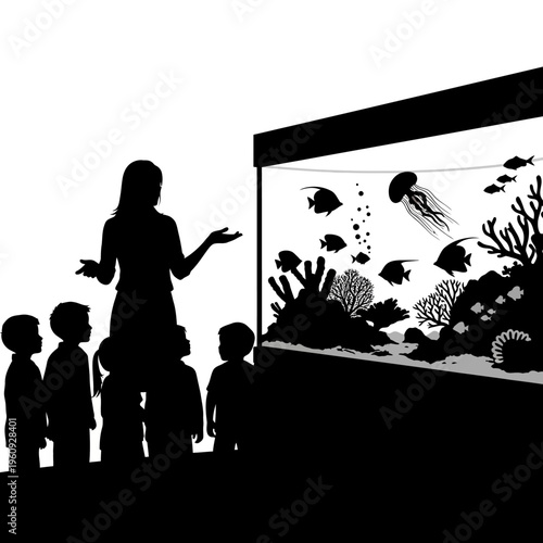 Silhouette of people looking at aquarium.