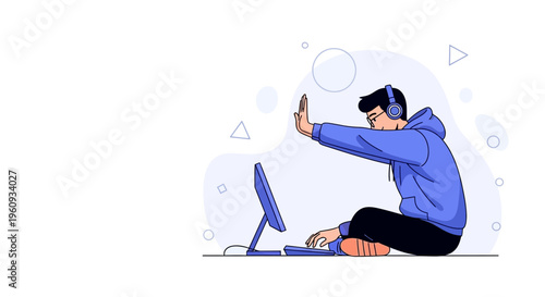 Gamer with headphones blocking screen, sitting on floor, playing video game on computer