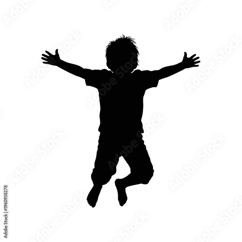Silhouette of a Happy Young Boy.