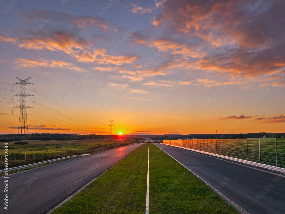 Naklejka premium A beautiful sunset over the new highway in Poland.