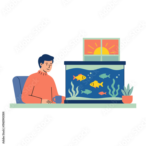A man sits at a desk looking at fish in an aquarium indoors.