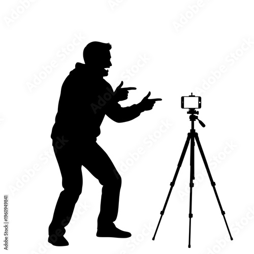 Man Silhouette Recording Video Content.