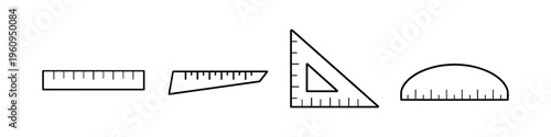 Collection of drafting and measuring tools including rulers and a triangle