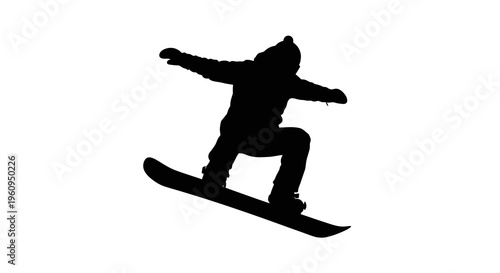 Silhouette of a person snowboarding on a in a dynamic pose