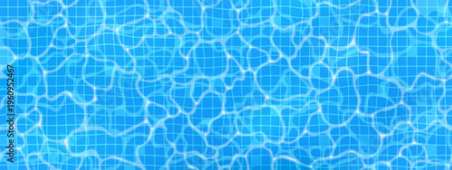 Ripple water texture in the swimming pool. Water surface. Blue tiles, mosaic. Top view.