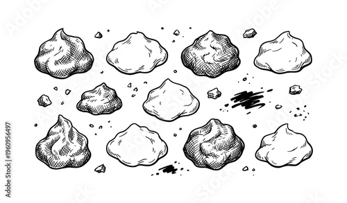 Hand-drawn black and white meringue cookies and crumbs sketch on white background