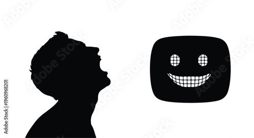 Silhouette of a person looking at a smiling face icon
