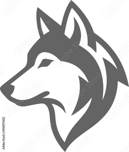 Profile of a wolf or husky head featuring sharp ears and a focused gaze