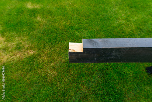 Wooden beam with groove for terrace construction