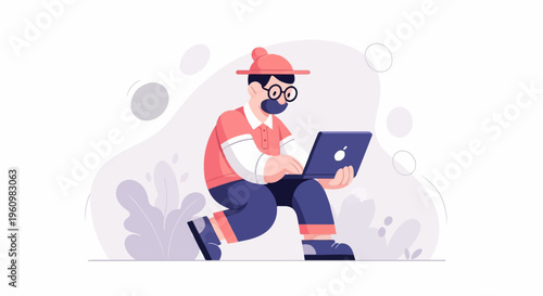 A man in a hat and glasses is seated and typing on a laptop