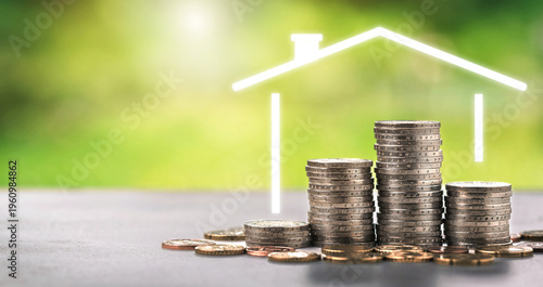 House outline over stacked coins mortgage investment