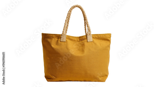 Isolated casual mustard yellow fabric tote bag with braided rope handles for shopping