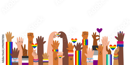 Multiple hands with different skin tones and LGBT flags and symbols in a horizontal composition. Concept of diversity, inclusion, pride, equality, identity and support for the LGBTQ community.