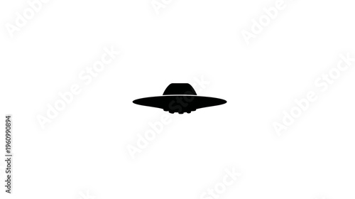 Flying saucer silhouette on white background. Extraterrestrial spaceship icon. Sci-fi concept graphic element.