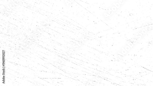 White surface with scattered grey dust particles and fine scratches