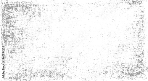 Grungy distressed textured background with grey speckles and smudges on white grunge