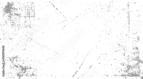 Textured distressed grunge background with gray speckles and scratches on white abstract