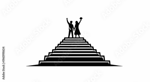 Couple holding hands at the top of stairs with arms raised