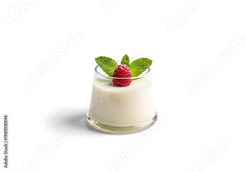 Glass of creamy dessert topped with fresh raspberries and mint leaves on white transparent background