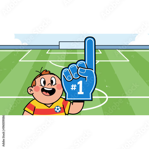 Cheering boy holds up a foam finger on a soccer field during a game.