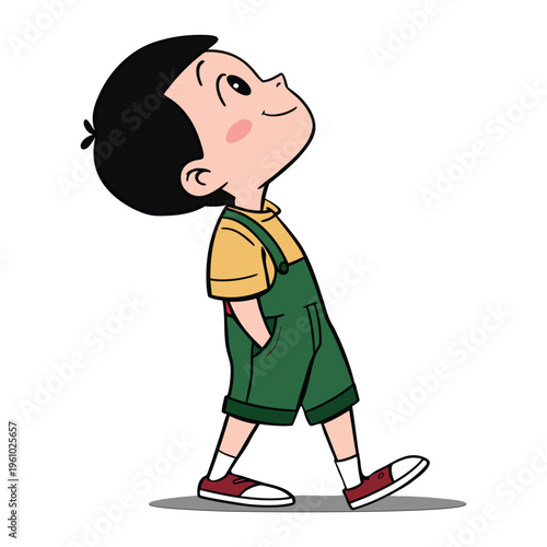 Cute boy walking and looking up in yellow shirt and green overalls