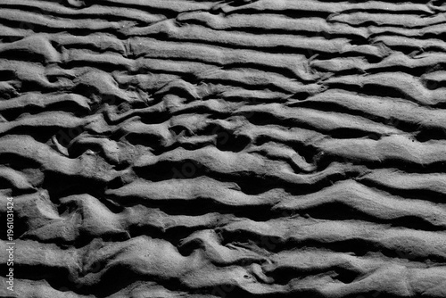 Black and white texture of wind ripples on sand dunes