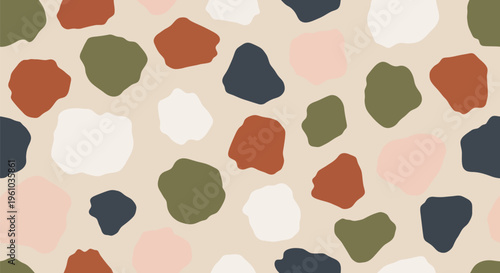 Colorful abstract terrazzo pattern with multicolored spots on beige background for design