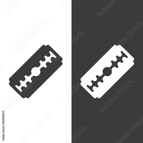 A stark contrast Two razor blades against opposing black and white backgrounds