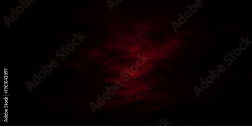 Abstract Red Cloud: A mesmerizing shot of a vibrant red cloud formation, suspended in a dark, mysterious realm. Evoking a sense of drama, intensity and emotion.